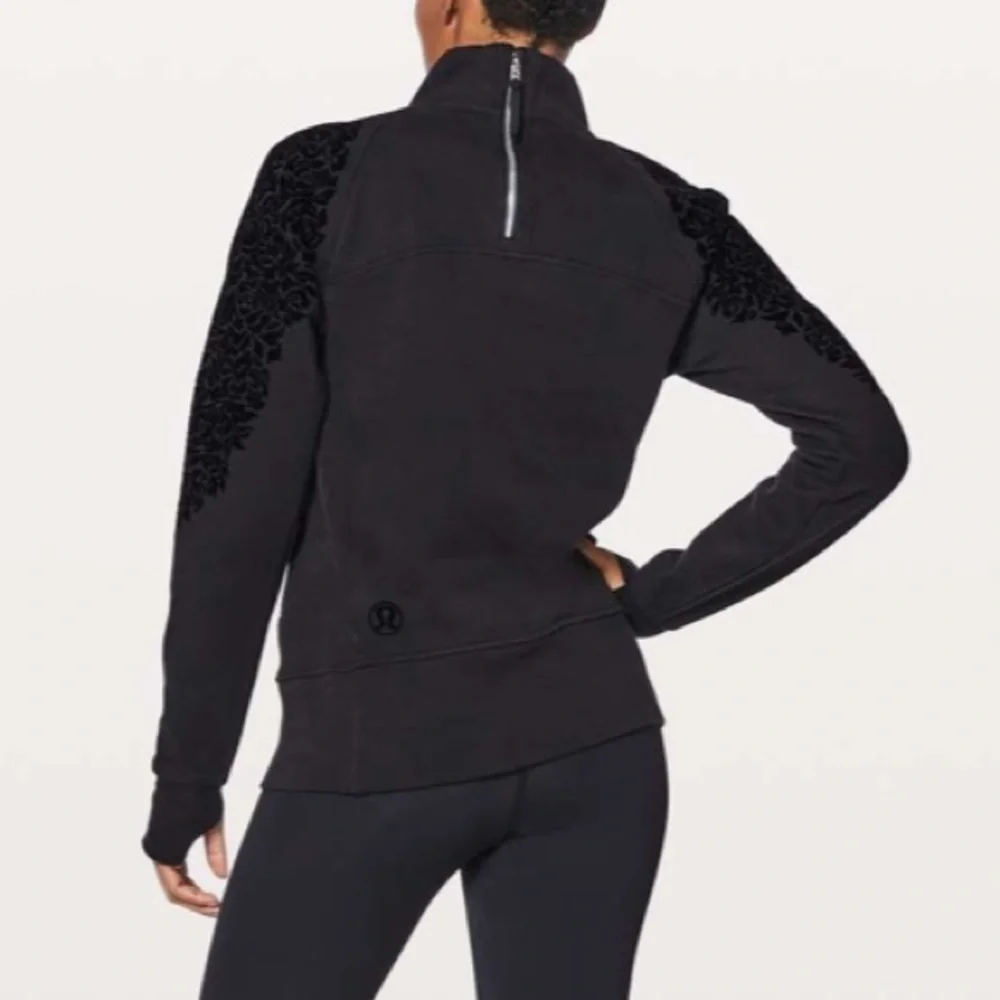 Lululemon Black Floral Flock Pullover sz 10